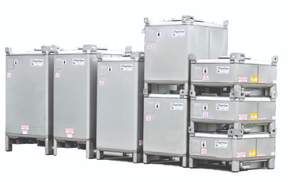 Row of stainless steel SuperTainer IBC totes, single and stacked two and three high
