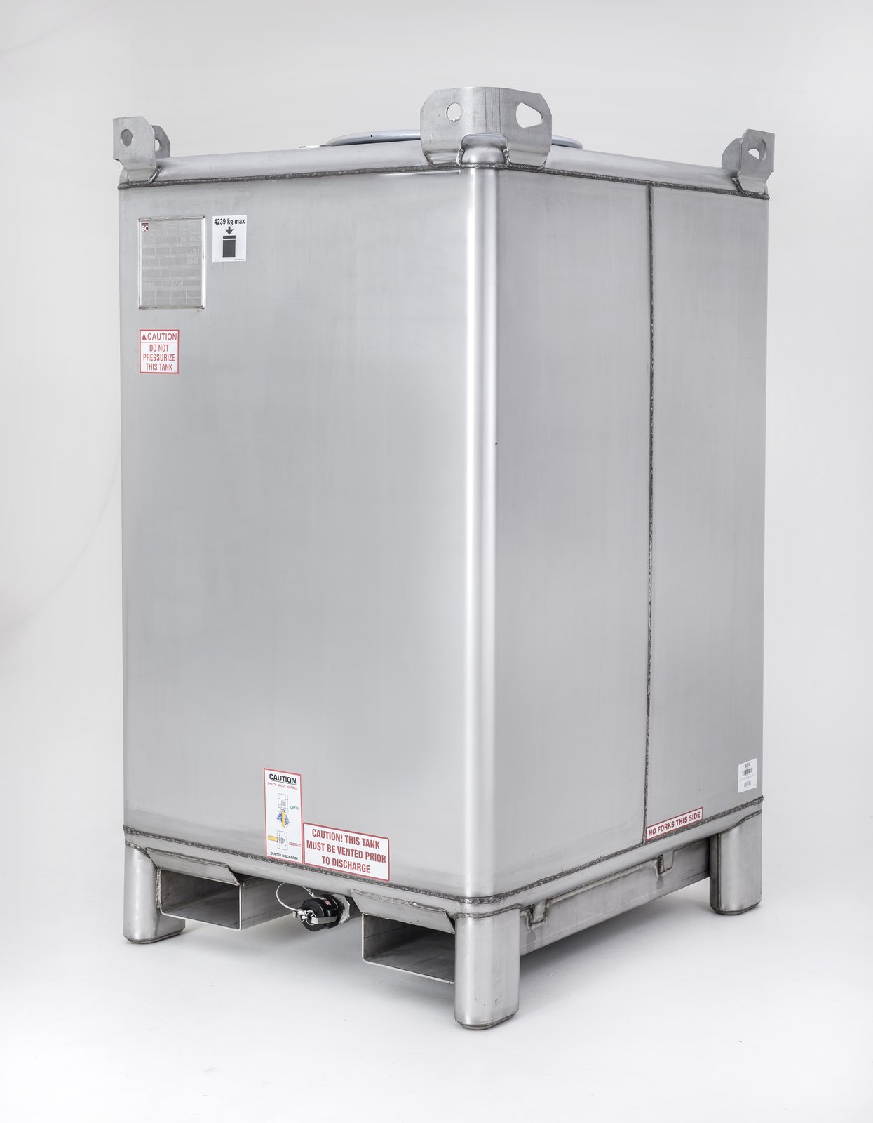 A single square stainless steel intermediate bulk container photographed three-quarter view on a plain white studio background. It has four corner lifting lugs, a top man