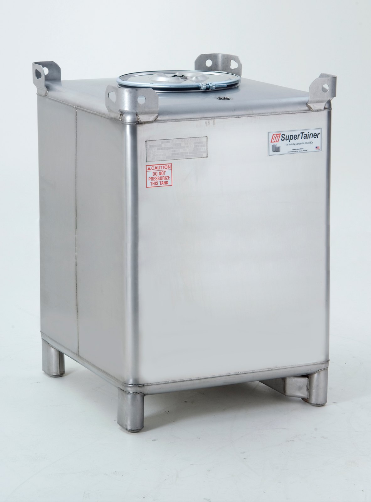 A square stainless steel intermediate bulk container photographed three-quarter view on a plain white studio background. It has a large clamped round manway on top, four